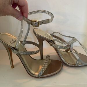 Stuart Weitzman glitzy, strappy, heels.